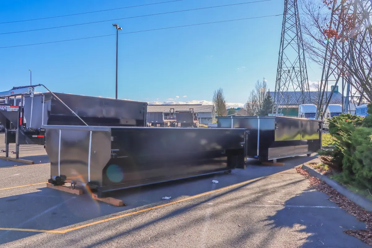 Roll-off dumpster ready for waste disposal at job site for 4 Yard Dumpster Rental in Chardon